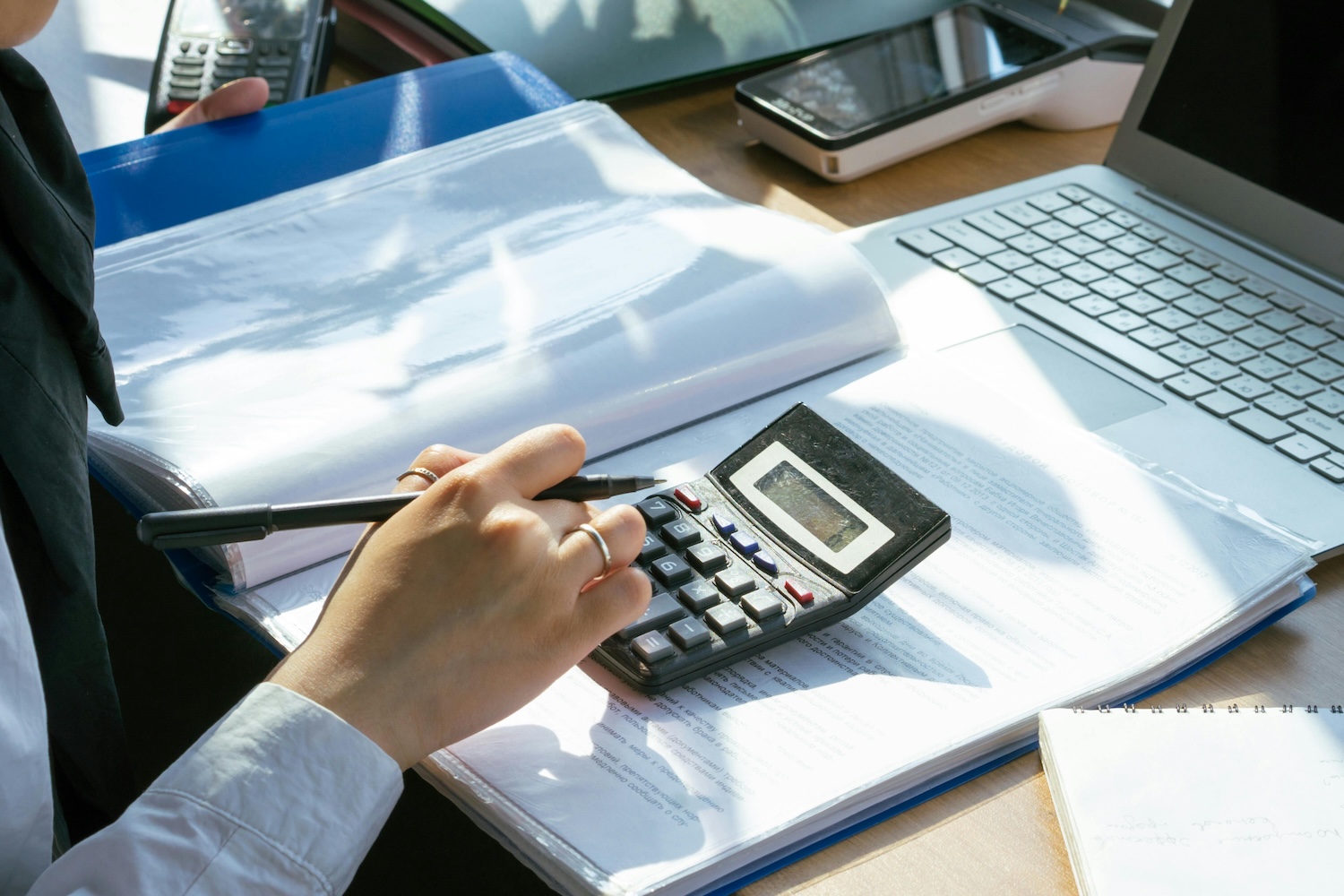 Person analyzing IT consulting costs